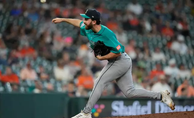 Seattle Mariners pitcher Nick Davila throws during the seventh inning of a baseball game against the Houston Astros in Houston, Thursday, May 14, 2026. (AP Photo/Ashley Landis)