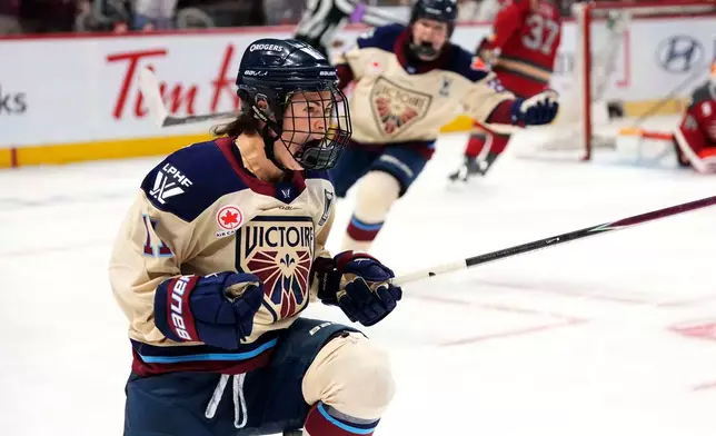 Montreal Victoire's Abby Roque (11) celebrates her goal against the Ottawa Charge during third period in Game 4 PWHL Walter Cup final hockey game in Ottawa, Wednesday, May 20, 2026. (Justin Tang/The Canadian Press via AP)