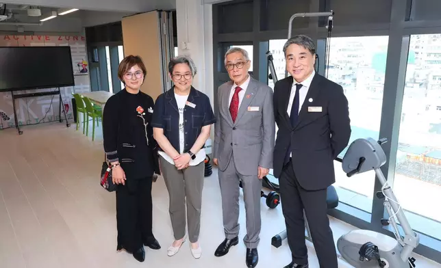 Guests tour the facilities of Jockey Club Key House.