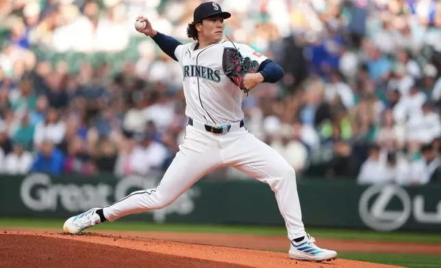 Seattle Mariners starting pitcher Bryan Woo throws against the Chicago White Sox during the first inning of a baseball game, Monday, May 18, 2026, in Seattle. (AP Photo/Lindsey Wasson)