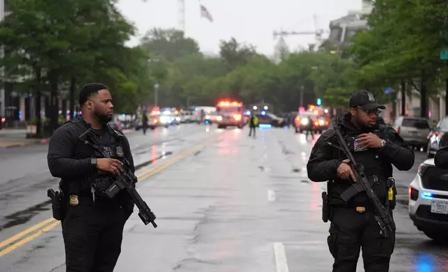 Police and members of the Secret Service block streets around the White House, Saturday, May 23, 2026, in Washington. (AP Photo/Alex Brandon)