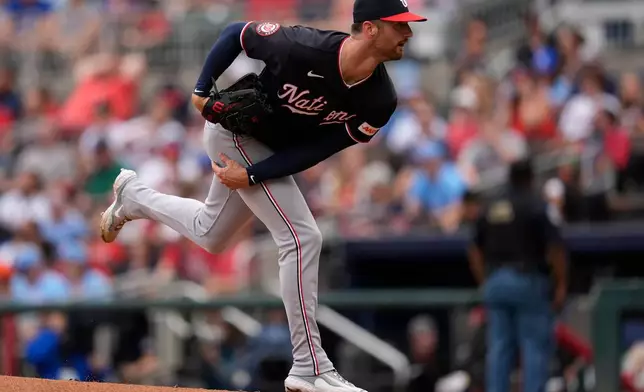 Washington Nationals pitcher Foster Griffin (22) works in the first inning of a baseball game against the Atlanta Braves, Sunday, May 24, 2026, in Atlanta. (AP Photo/Mike Stewart)