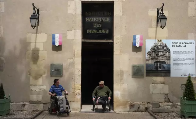 Patients are seen in front of the entrance of the National Institution of Invalides in Paris, May 6, 2026.(AP Photo/Thibault Camus)