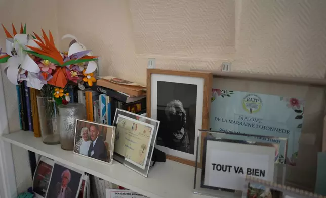Books and photos in the room of Auschwitz concentration camp survivor Esther Senot at the National Institution of Invalides in Paris, on May 6, 2026.(AP Photo/Thibault Camus)