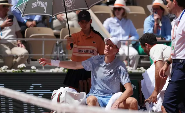 Jannik Sinner of Italy reacts during a break at the second round men's singles tennis match against Juan Manuel Cerundolo of Argentina at the French Open tennis tournament in Paris, Thursday, May 28, 2026. (AP Photo/Thibault Camus)