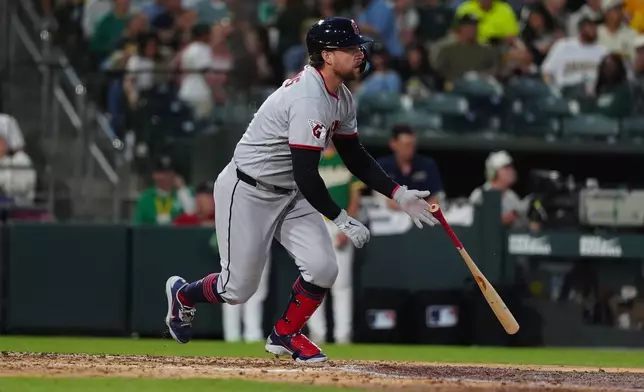 Cleveland Guardians' Rhys Hoskins hits a bases loaded two-run RBI double in the fifth inning of a baseball game against the Athletics Friday, May 1, 2026, in West Sacramento, Calif. (AP Photo/Alan Greth)