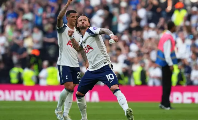 Tottenham's James Maddison celebrates after beating Everton during the English Premier League soccer match in London, England, Sunday, May 24, 2026. (AP Photo/Frank Augstein)
