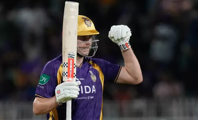 Kolkata Knight Riders' Cameron Green celebrates his fifty runs during the Indian Premier League cricket match between Gujarat Titans and Kolkata Knight Riders, in Kolkata , India, Saturday, May 16, 2026. (AP Photo/Bikas Das)