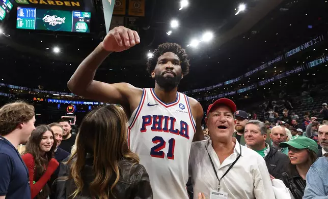Philadelphia 76ers' Joel Embiid celebrates following his team's victory over the Boston Celtics after the Game 7 in a first-round NBA basketball playoffs series, Saturday, May 2, 2026 in Boston. (AP Photo/Jim Davis)