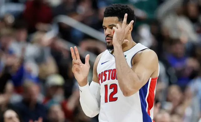 Detroit Pistons forward Tobias Harris (12) celebrates after scoring against the Orlando Magic during the fourth quarter in Game 5 of a first-round NBA basketball playoffs series Wednesday, April 29, 2026, in Detroit. (AP Photo/Duane Burleson)
