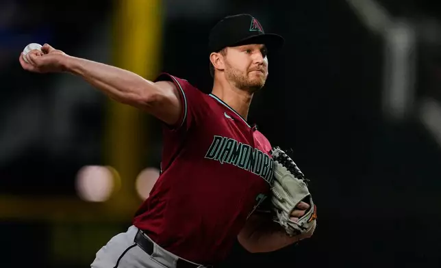 Arizona Diamondbacks pitcher Michael Soroka throws to the Texas Rangers in the first inning of a baseball game Monday, May 11, 2026, in Arlington, Texas. (AP Photo/Tony Gutierrez)