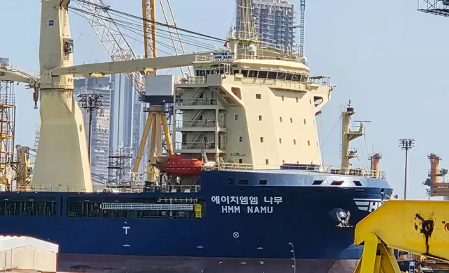 The South Korean-operated vessel HMM NAMU is docked after being damaged from a fire following an explosion in the Strait of Hormuz, at a port in Dubai, United Arab Emirates, Friday, May 8, 2026. (Kim Sang-hun/Yonhap via AP)