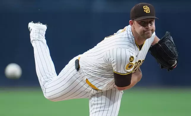 San Diego Padres starting pitcher Michael King works against a St. Louis Cardinals batter during the first inning of a baseball game Thursday, May 7, 2026, in San Diego. (AP Photo/Gregory Bull)