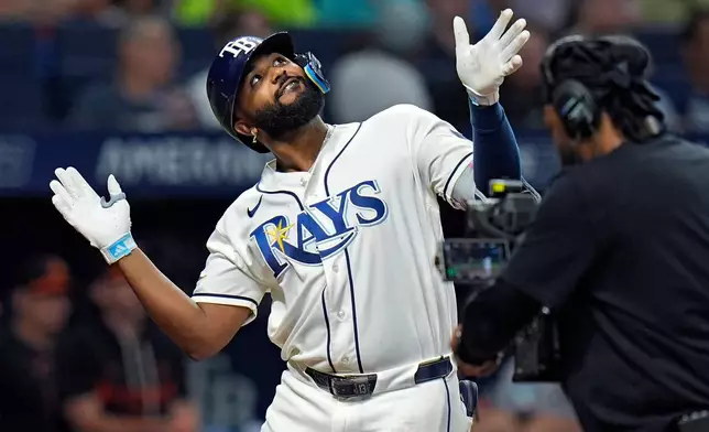 Tampa Bay Rays' Junior Caminero reacts after his three-run home run off Baltimore Orioles pithcer Cameron Foster during the fifth inning of a baseball game Monday, May 18, 2026, in St. Petersburg, Fla. (AP Photo/Chris O'Meara)