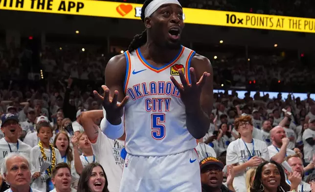 Oklahoma City Thunder guard Luguentz Dort (5) reacts to a foul in the second half of Game 5 in the Western Conference finals NBA basketball playoffs series against the San Antonio Spurs, Tuesday, May 26, 2026, in Oklahoma City. (AP Photo/Julio Cortez)