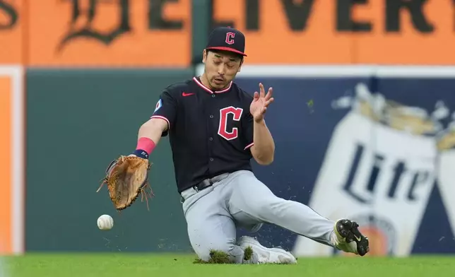 Cleveland Guardians center fielder Steven Kwan can't catch a Detroit Tigers' Hao-Yu Lee fly ball during the sixth inning of a baseball game Wednesday, May 20, 2026, in Detroit. (AP Photo/Paul Sancya)