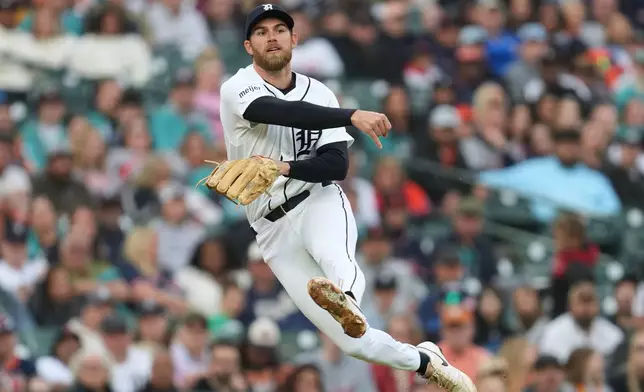 Detroit Tigers third baseman Gage Workman throws to first base against the Cleveland Guardians during the sixth inning of a baseball game Wednesday, May 20, 2026, in Detroit. (AP Photo/Paul Sancya)