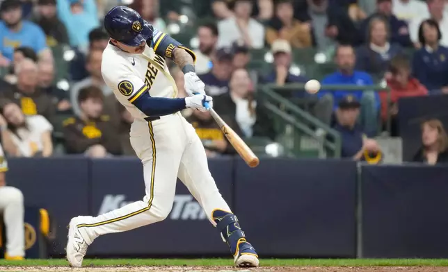 Milwaukee Brewers' Joey Ortiz hits a solo home run during the third inning of a baseball game against the San Diego Padres, Tuesday, May 12, 2026, in Milwaukee. (AP Photo/Aaron Gash)