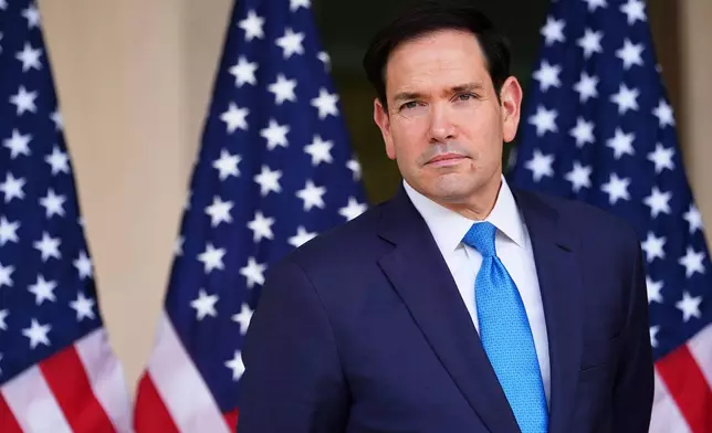 United States Secretary of State Marco Rubio, waits as US Ambassador to India Sergio Gor, unseen, speaks at a dedication ceremony for an annex building at the U.S. Embassy in New Delhi, India, Saturday, May 23, 2026. (AP Photo/Julia Demaree Nikhinson, Pool)