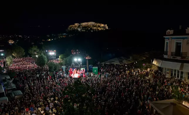 Former left-wing Prime Minister Alexis Tsipras speaks to supporters in front of ancient Acropolis at an event to launch a new political party ahead of elections next year, in Athens, on Tuesday, May 26, 2026. (AP Photo/Petros Giannakouris)