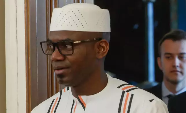 FILE - Mali's Defense Minister Sadio Camara enters a hall for a talk in Moscow, Russia, on Feb. 28, 2024. (Maxim Shipenkov/Pool Photo via AP, File)