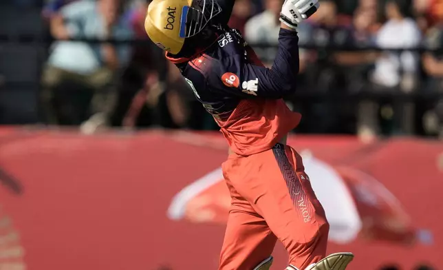 Royal Challengers Bengaluru's Venkatesh Iyer plays a shot during the Indian Premier League cricket match between Punjab Kings and Royal Challengers Bengaluru in Dharamshala, India, Sunday, May 17, 2026. (AP Photo/Ashwini Bhatia)