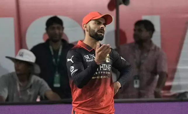 Royal Challengers Bengaluru's Virat Kohli reacts after miss field during the Indian Premier League cricket match between Punjab Kings and Royal Challengers Bengaluru in Dharamshala, India, Sunday, May 17, 2026. (AP Photo/Ashwini Bhatia)