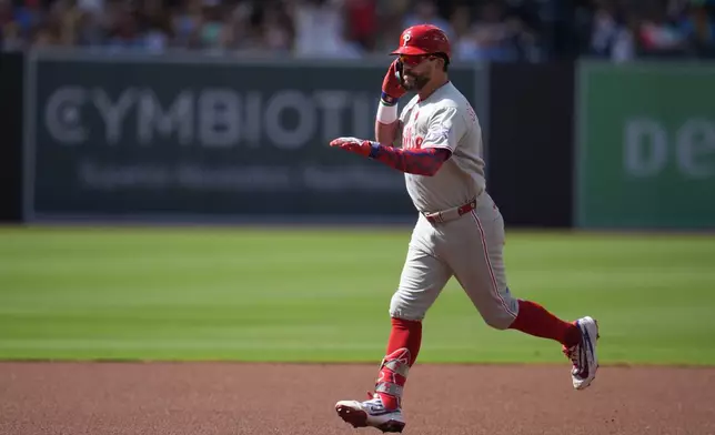 Philadelphia Phillies' Kyle Schwarber celebrates after hitting a home run during the first inning of a baseball game against the San Diego Padres Monday, May 25, 2026, in San Diego. (AP Photo/Gregory Bull)