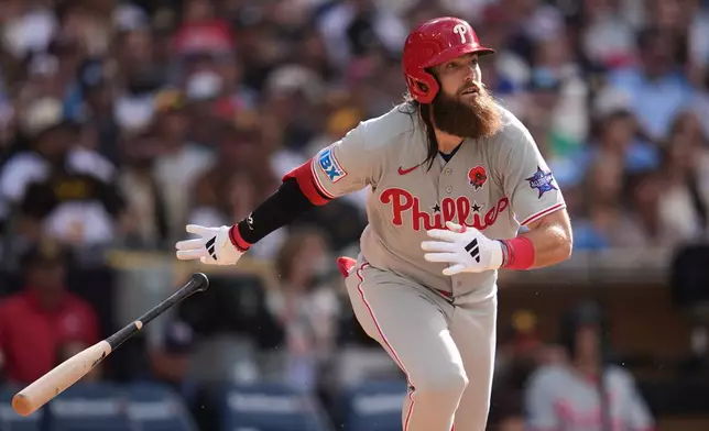 Philadelphia Phillies' Brandon Marsh watches his two-run home run during the seventh inning of a baseball game against the San Diego Padres Monday, May 25, 2026, in San Diego. (AP Photo/Gregory Bull)