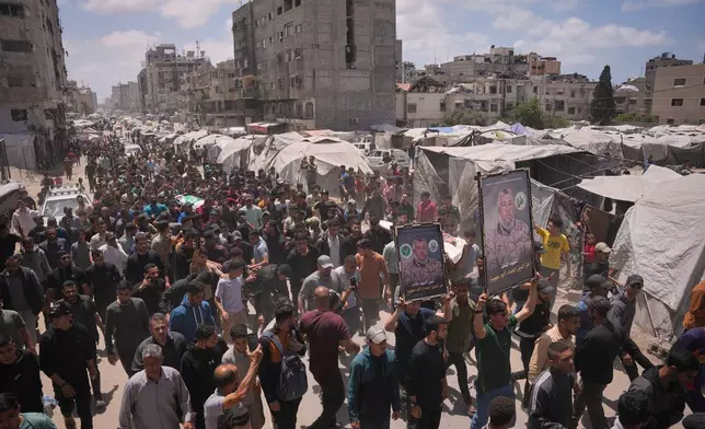 Palestinians attend the funeral of Izz al-Din al-Haddad, the leader of Hamas’ Qassam Brigades, and his daughter and wife in Gaza City, Saturday, May 16, 2026. They were killed in an Israeli strike Friday evening. (AP Photo/Abdel Kareem Hana)