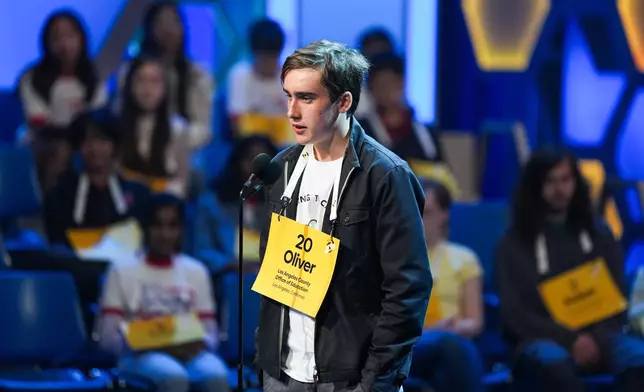 Oliver Halkett, 14, Los Angeles, Calif., competes during the first preliminary round of the Scripps National Spelling Bee, Tuesday, May 26, 2026, in Washington. (AP Photo/Allison Robbert)