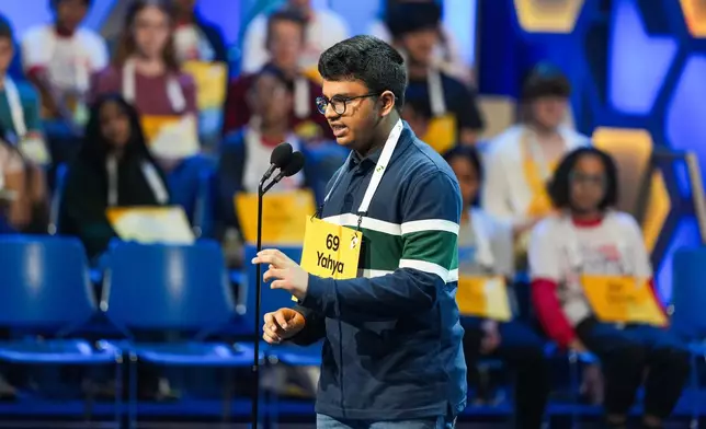 Yahya Mohammed, 14, of Hoffman Estates, Ill., competes during the first preliminary round of the Scripps National Spelling Bee, Tuesday, May 26, 2026, in Washington. (AP Photo/Allison Robbert)