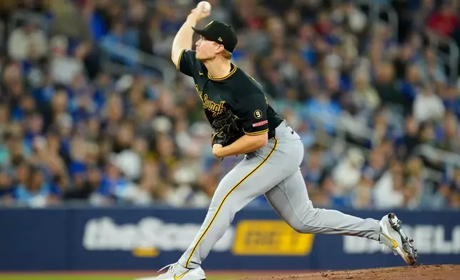 Pittsburgh Pirates pitcher Mitch Keller (23) throws during the first inning of a baseball game against the Toronto Blue Jays in Toronto on Sunday, May 24, 2026. (Frank Gunn /The Canadian Press via AP)