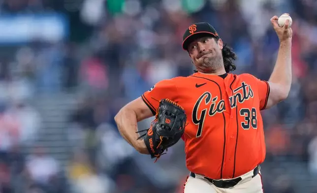 San Francisco Giants' Robbie Ray pitches to a Pittsburgh Pirates batter during the first inning of a baseball game Friday, May 8, 2026, in San Francisco. (AP Photo/Godofredo A. Vásquez)