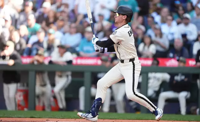 Seattle Mariners' Colt Emerson lines out in his first major league at-bat against the San Diego Padres during the third inning of a baseball game, Sunday, May 17, 2026, in Seattle. (AP Photo/Lindsey Wasson)