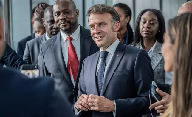 France's President Emmanuel Macron speaks with delegates at the African Union headquarters in Addis Ababa, Ethiopia, Wednesday, May 13, 2026. (AP Photo/Amanuel Sileshi)