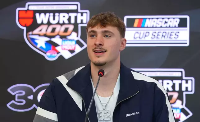 Dallas Mavericks forward Cooper Flagg answers a question before acting as honorary pace car driver for a NASCAR Cup Series auto race at Texas Motor Speedway in Fort Worth, Texas, Sunday, May 3, 2026. (AP Photo/LM Otero)