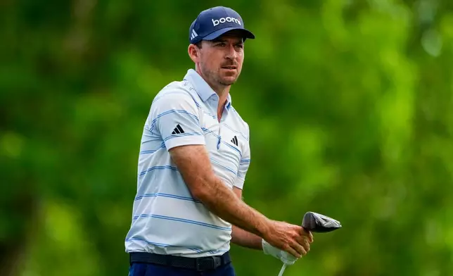 Nick Taylor, of Canada, hits from the 18th tee during first round of the Truist Championship golf tournament at the Quail Hollow Club, Thursday, May 7, 2026, in Charlotte, N.C. (AP Photo/Chris Carlson)d