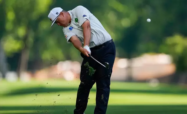 Sungjae Im, of South Korea, hits from the second fairway during first round of the Truist Championship golf tournament at the Quail Hollow Club, Thursday, May 7, 2026, in Charlotte, N.C. (AP Photo/Chris Carlson)