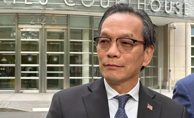 Lu Jianwang leaves a U.S. courthouse in Brooklyn, New York on Wednesday, May 13, 2026, following his conviction of acting as an illegal foreign agent for China. (AP Photo/Michael R. Sisak)