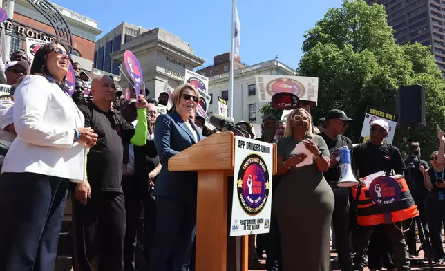 Massachusetts Democratic Gov. Maura Healey speaks during a rally outside the Massachusetts State House after the App Drivers Union announced it had become the first certified union of rideshare drivers in the nation, on Tuesday, May 26, 2026, in Boston. (AP Photo/Leah Willingham)