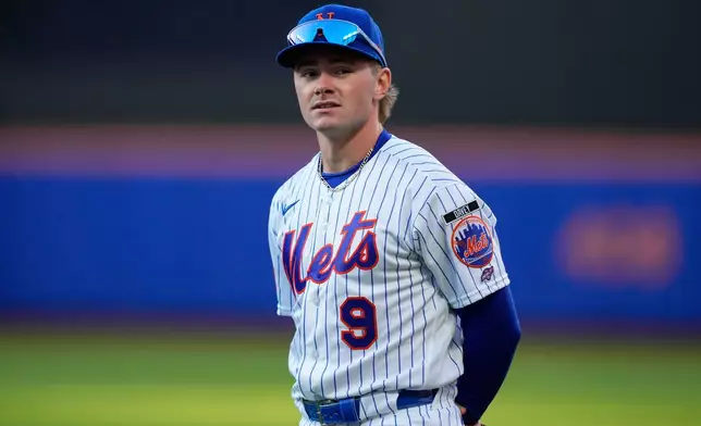 New York Mets center fielder A.J. Ewing (9) warms up before a baseball game against Detroit Tigers, Tuesday, May 12, 2026, in New York. (AP Photo/Yuki Iwamura)