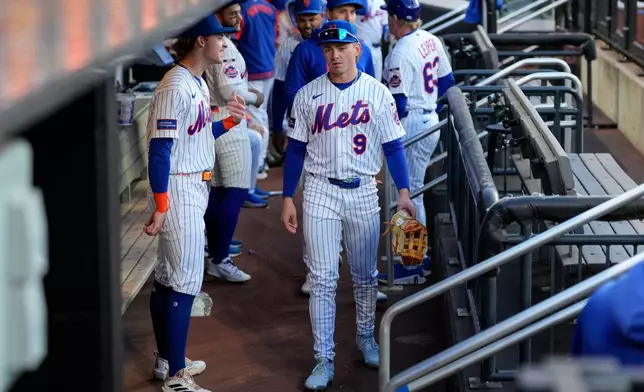 New York Mets center fielder A.J. Ewing (9) walks in dugout before a baseball game against Detroit Tigers, Tuesday, May 12, 2026, in New York. (AP Photo/Yuki Iwamura)