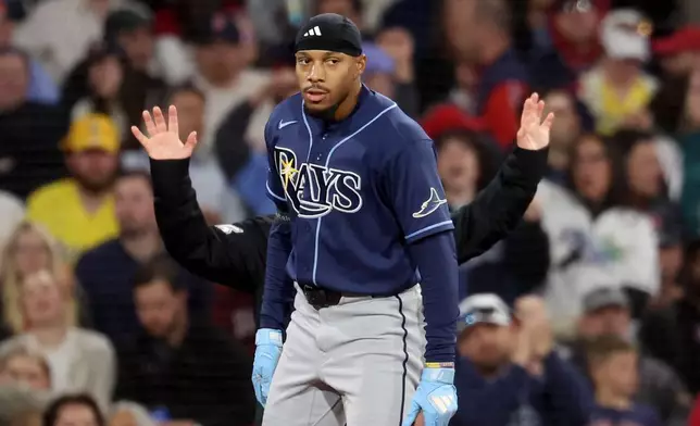 Tampa Bay Rays' Chandler Simpson reacts after hitting a triple allowing teammate Ben Williamson to score during the eighth inning of a baseball game against the Boston Red Sox, Thursday, May 7, 2026, in Boston. (AP Photo/Mark Stockwell)