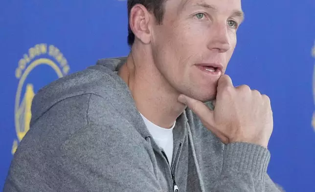 Golden State Warriors general manager Mike Dunleavy Jr. speaks during a news conference at the team's NBA basketball facility Friday, May 15, 2026, in San Francisco. (AP Photo/Jeff Chiu)