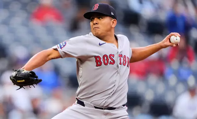 Boston Red Sox starting pitcher Ranger Suarez throws during the first inning of a baseball game against the Kansas City Royals, Tuesday, May 19, 2026, in Kansas City, Mo. (AP Photo/Charlie Riedel)