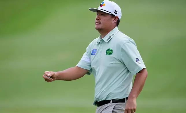 Sungjae Im, of South Korea, walks off the eighth hole during the final round of the CJ Cup Byron Nelson golf tournament in McKinney, Texas, Sunday, May 24, 2026. (AP Photo/Tony Gutierrez)