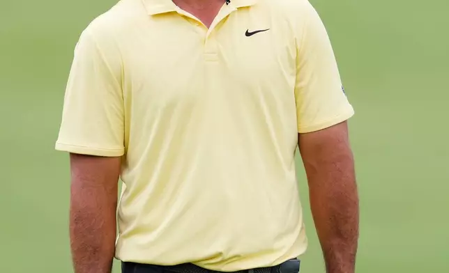 Brooks Koepka prepares to putt on the sixth green during the final round of the CJ Cup Byron Nelson golf tournament in McKinney, Texas, Sunday, May 24, 2026. (AP Photo/Tony Gutierrez)