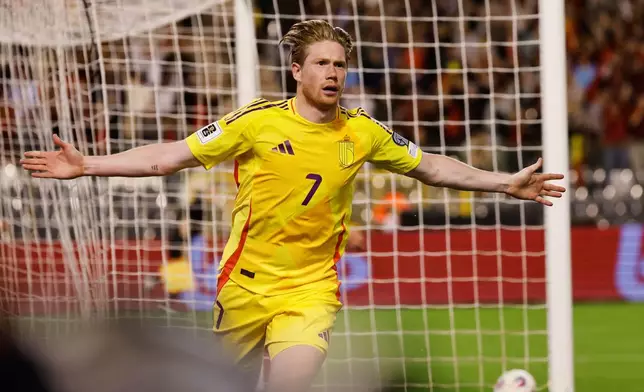 FILE - Belgium's Kevin De Bruyne celebrates after scoring his sides fourth goal during the World Cup 2026 group J qualifying soccer match between Belgium and Wales at King Baudouin stadium in Brussels, Monday, June 9, 2025. (AP Photo/Geert Vanden Wijngaert, file)
