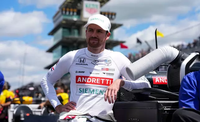 FILE - Kyle Kirkwood leans on a tool box as he waits for is turn during qualification for the Indianapolis 500 auto race at Indianapolis Motor Speedway in Indianapolis, May 17, 2025. (AP Photo/Michael Conroy, File)